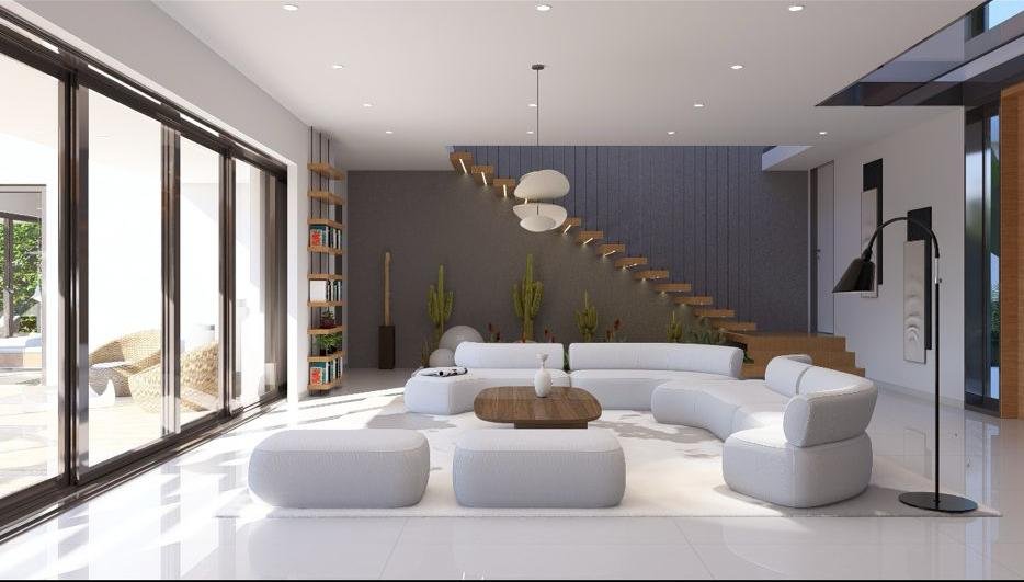 Salón moderno con sofá curvo y escalera flotante