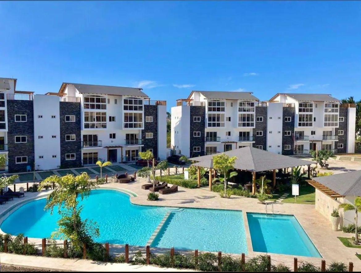 Apartamento En Popi (19) Complejo residencial moderno con piscina y jardín