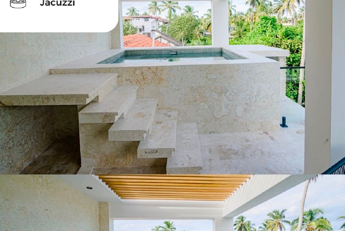 Jacuzzi moderno en terraza con vistas tropicales