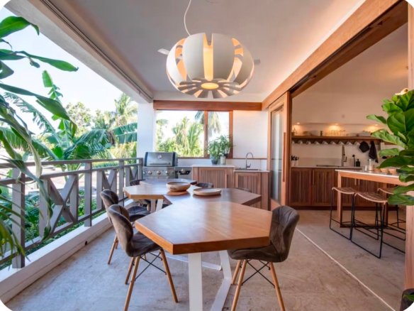 Modern terrace with dining area and outdoor kitchen
