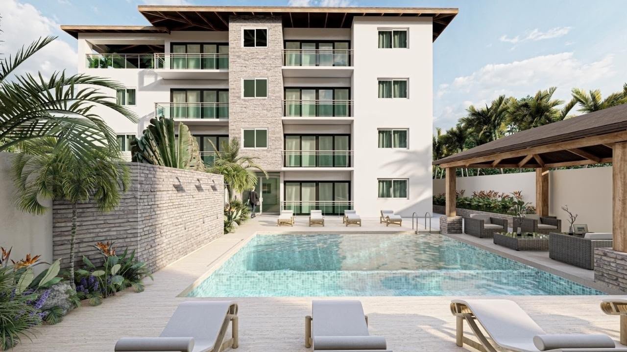 Edificio moderno con piscina y zona ajardinada