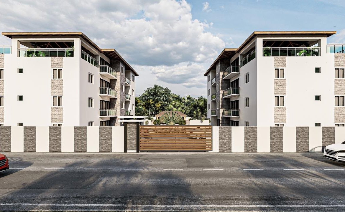 Edificios residenciales modernos con entrada y valla