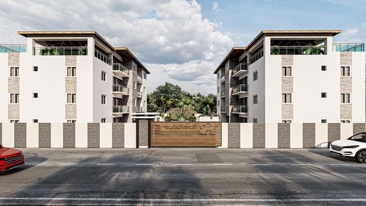 Edificios residenciales modernos con entrada y valla
