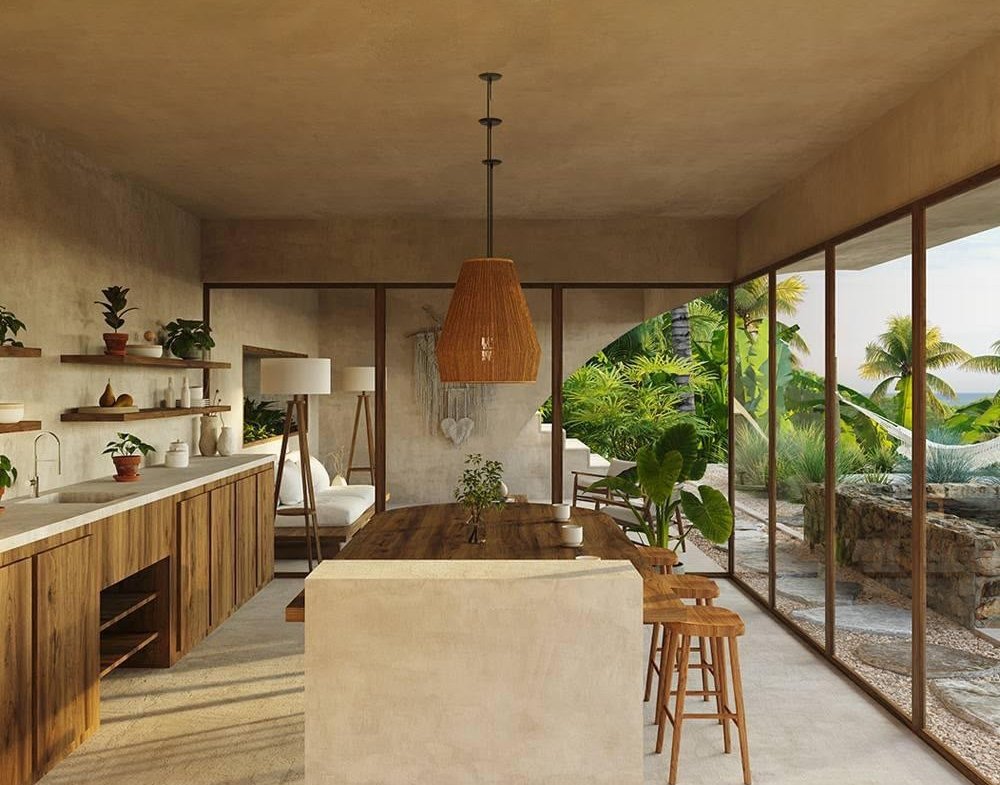 Cocina moderna abierta con vistas tropicales al jardín