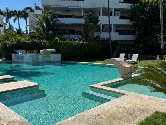 Tropical pool in front of a modern residential building